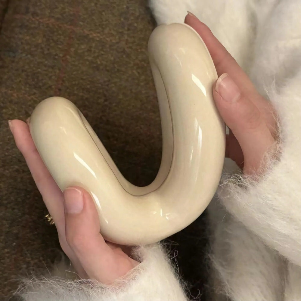 Keramiskt sminkborstställ med kurvig design