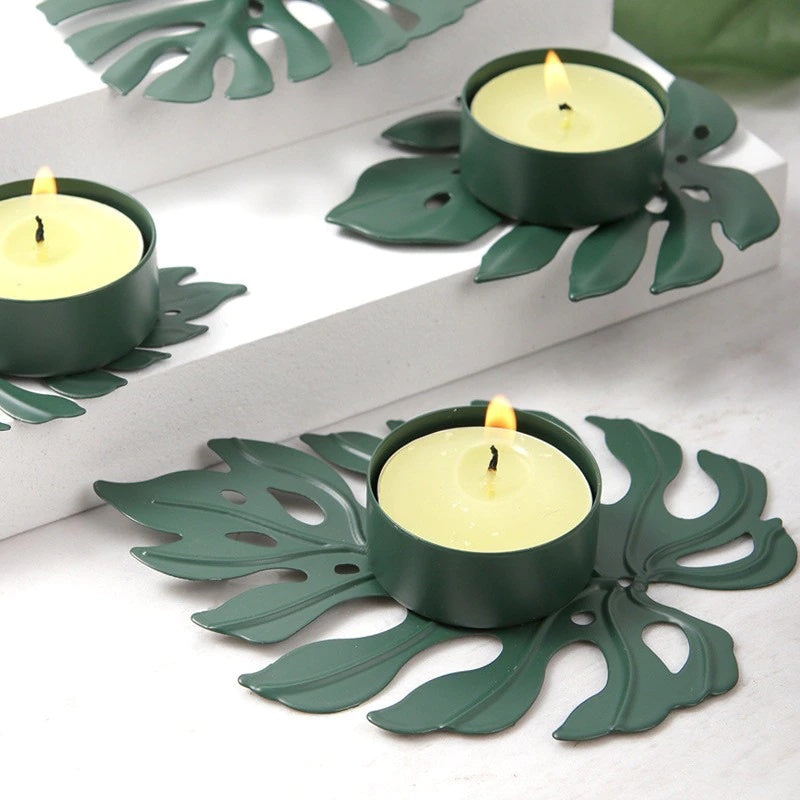 Keramisk ljushållare med monstera blad