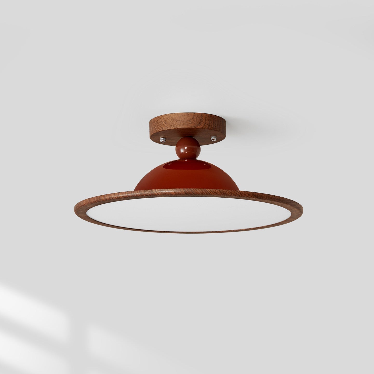 Elegant taklampa i valnöt med integrerad LED fotograferad i interiör