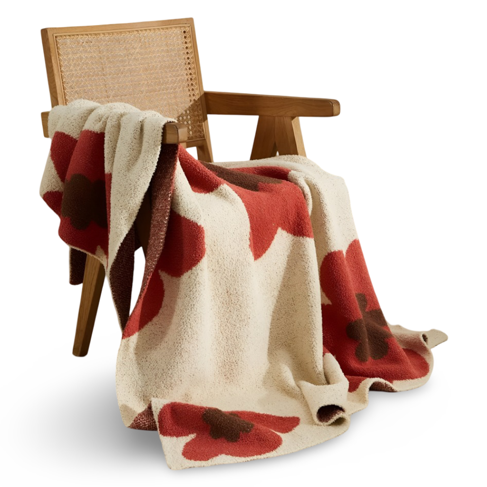 Blommönster Stickad Mysfilt – Bekväm och Stilig Inredningsfilt för Ditt Hem