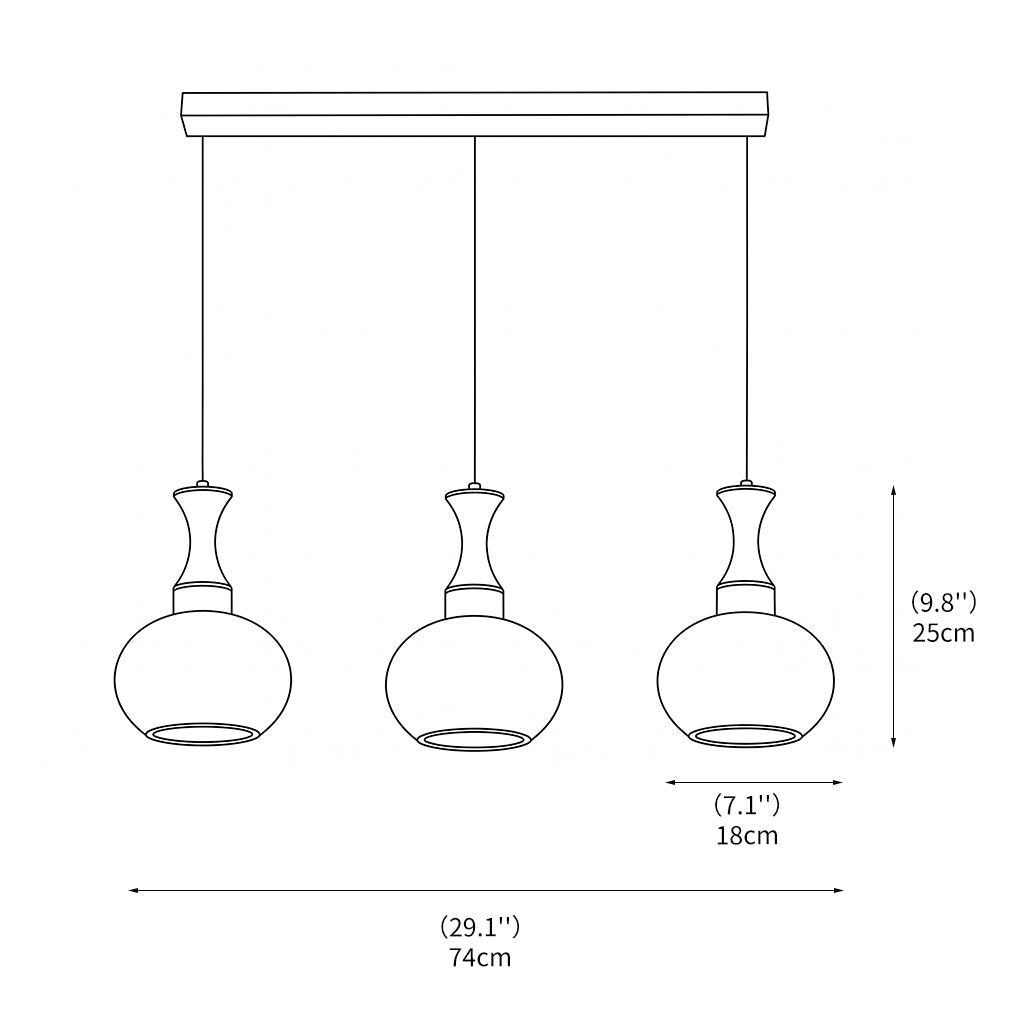 Pendellampa i trä och glas hängande över matbord