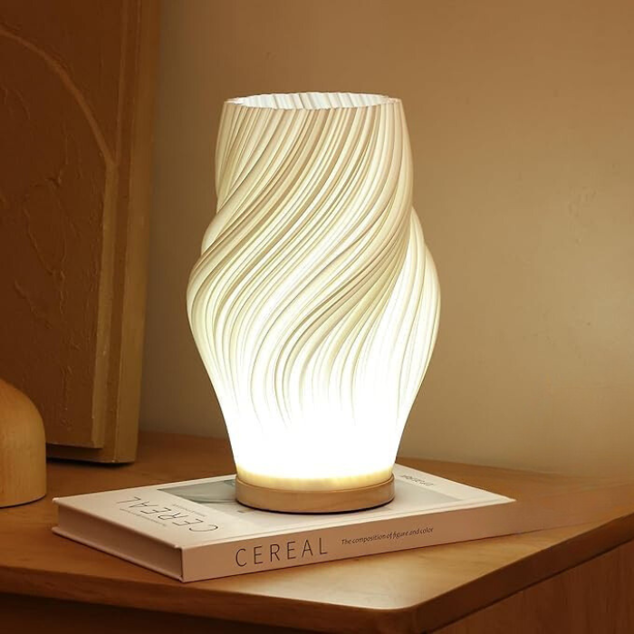 Dekorativ LED-bordslampa med mjukt varmt ljus på sidobord