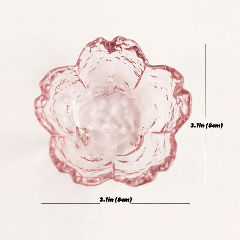 Ljuslykta i keramik med rosa blomdesign