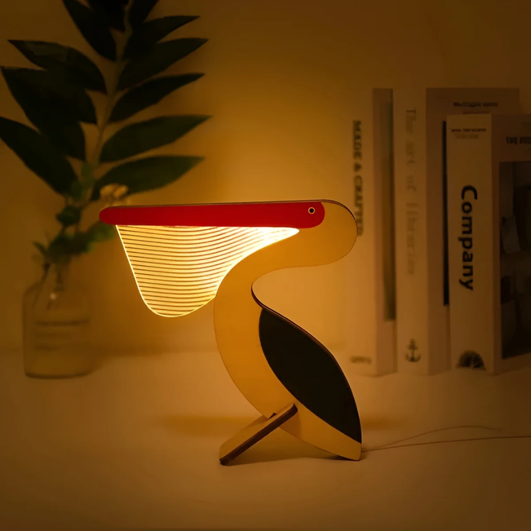 Detaljbild av bordslampans trädesign och LED-ljus