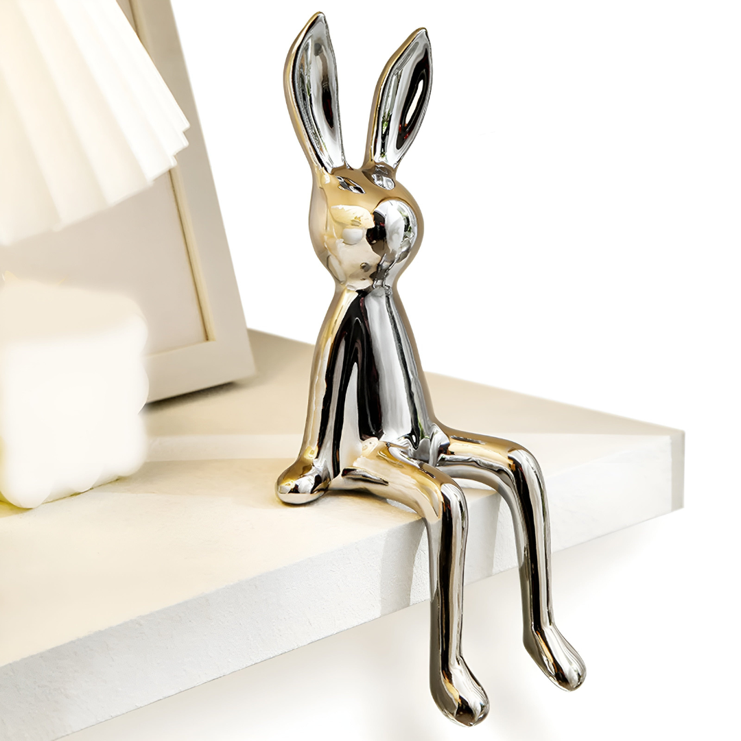 Minimalistisk kaninfigur i keramik som prydnad i hemmet