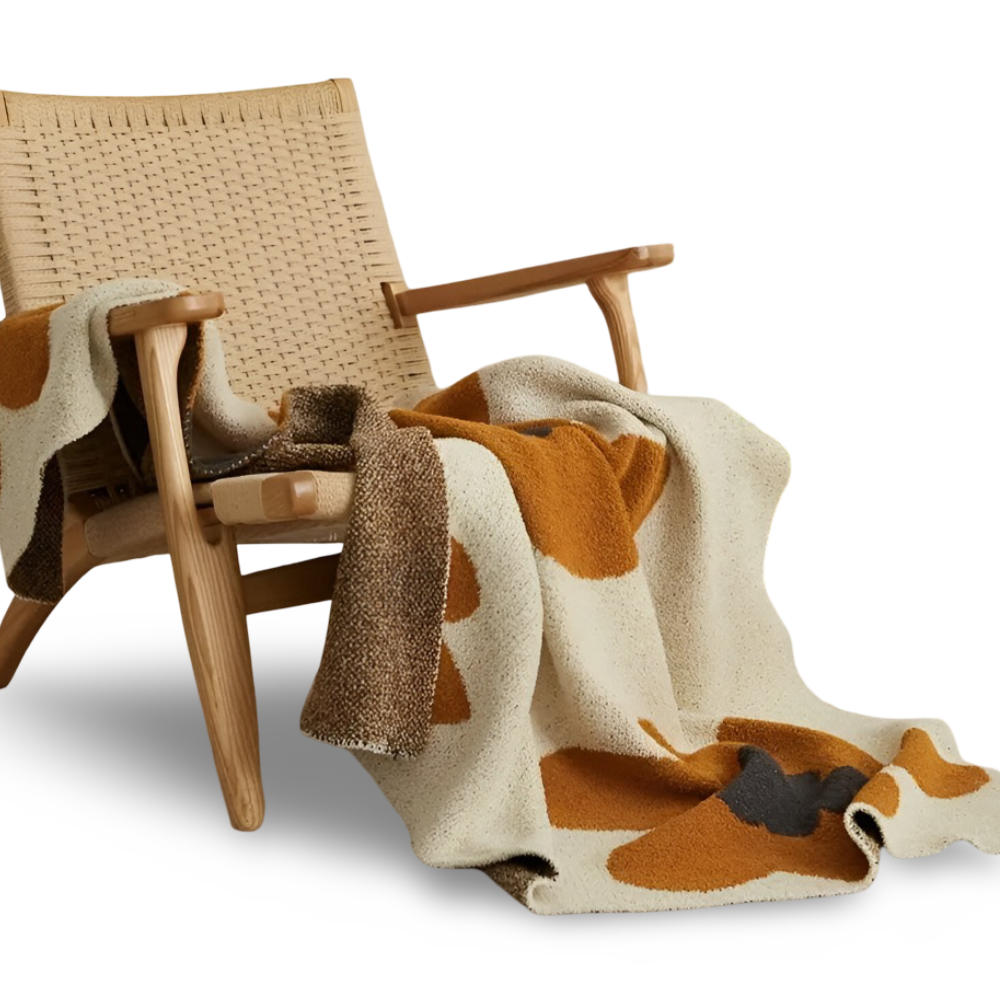 Blommönster Stickad Mysfilt – Bekväm och Stilig Inredningsfilt för Ditt Hem