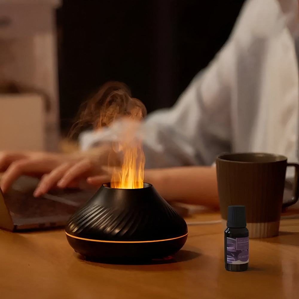 Närbild på aromadiffuser med mjuk LED-belysning och dimma