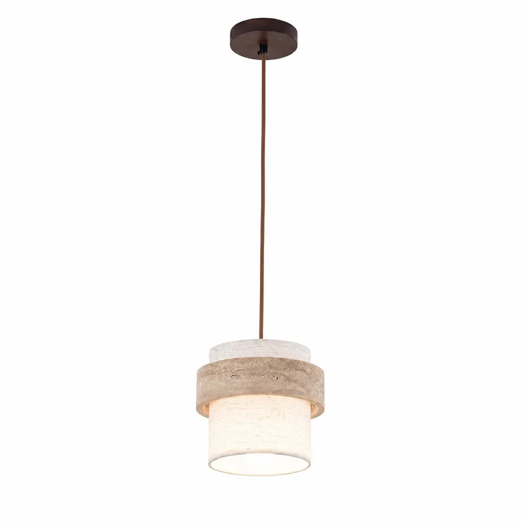 Travertinlampa i wabi-sabi stil ovanför ett bord i modern miljö
