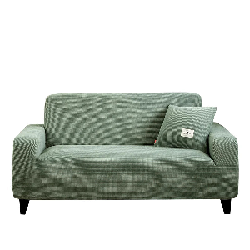 Sofföverdrag på 3-sitssoffa i jacquarddesign sett framifrån
