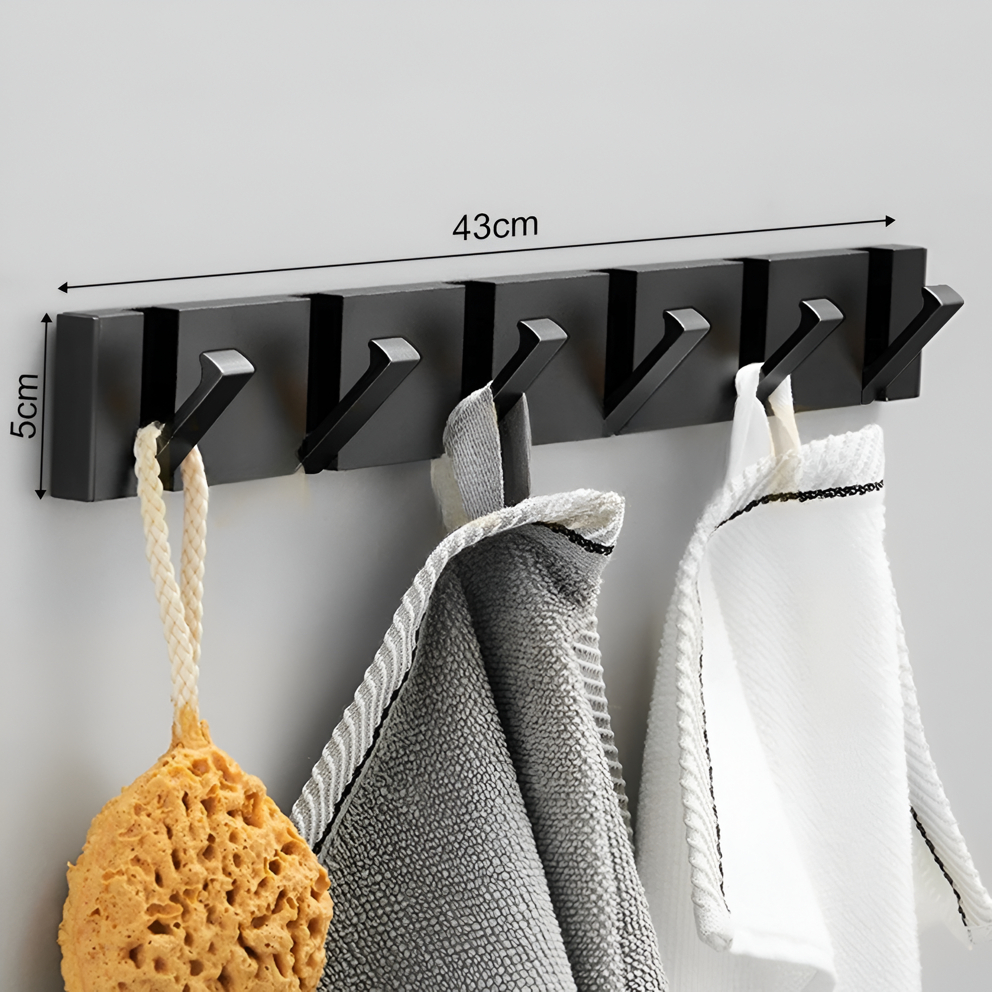 Väggkrok för badrum och kök med modern fällbar design