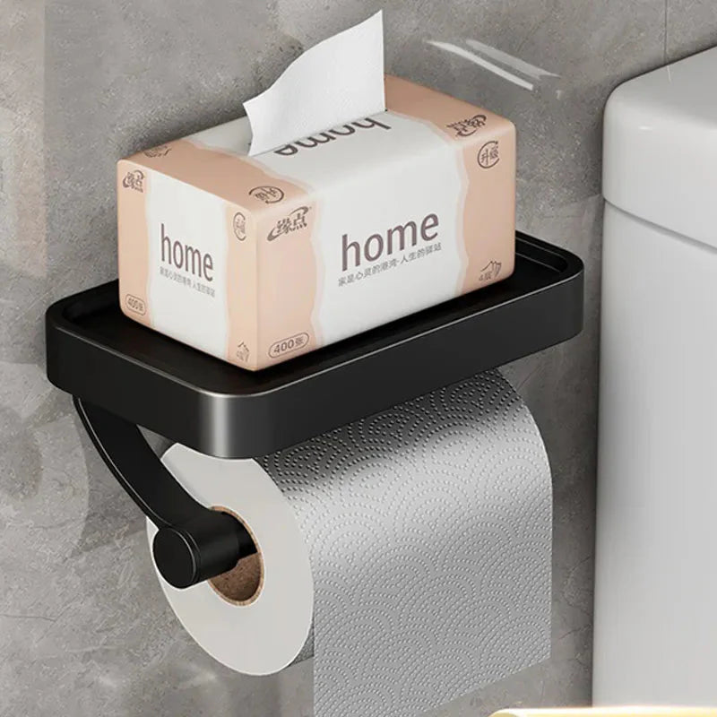 Toalettpappershållare med hylla sedd framifrån i stilren design
